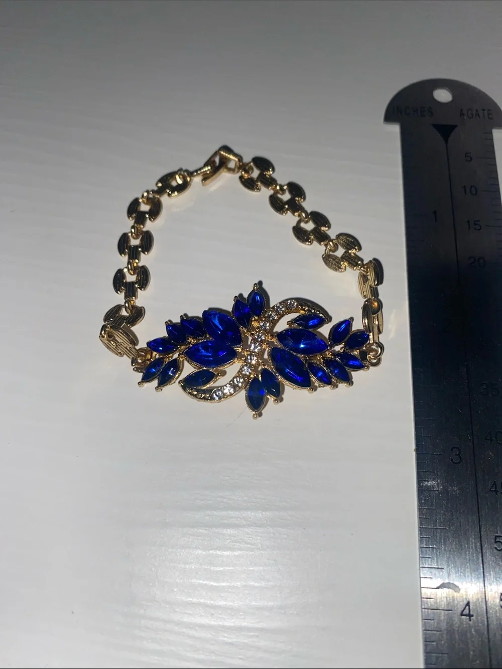 Girls Gold-Tone Bracelet with Deep Blue Crystal Flower Design